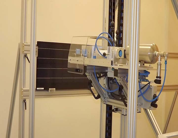 A laboratory device scanning a PV module